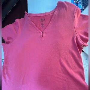 Jones New York Pink Short Sleeve Tee. Size XL
V Neck with small silver decor pc